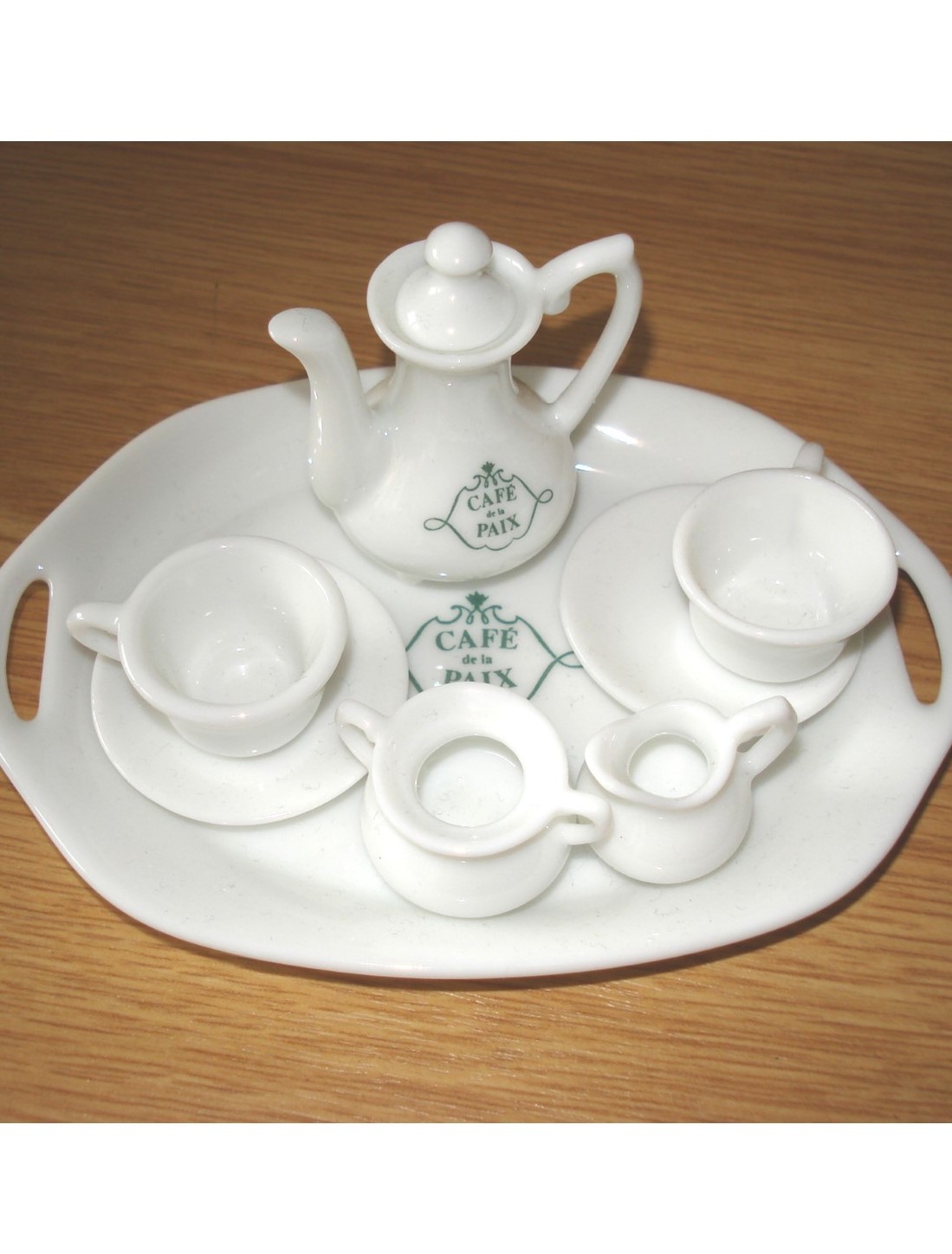 RARE SERVICE A THE 'CAFE DE LA PAIX' en Porcelaine